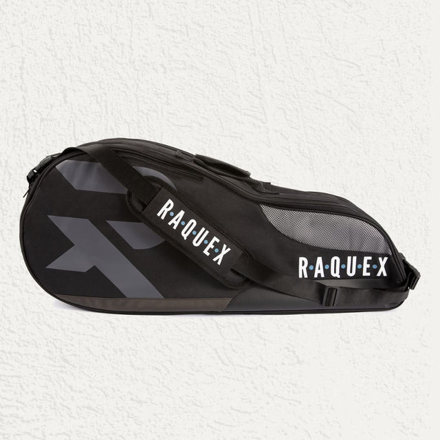 A blue and black Raquex racquet bag with the brand's logo displayed prominently on the side.