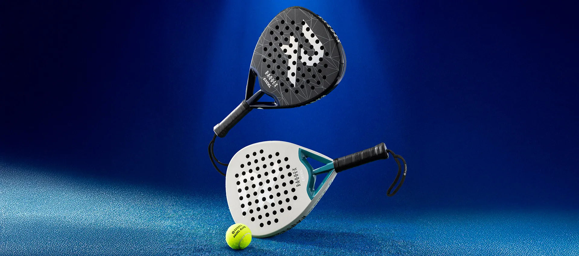 Two raquex paddle tennis rackets and a ball on a blue textured background