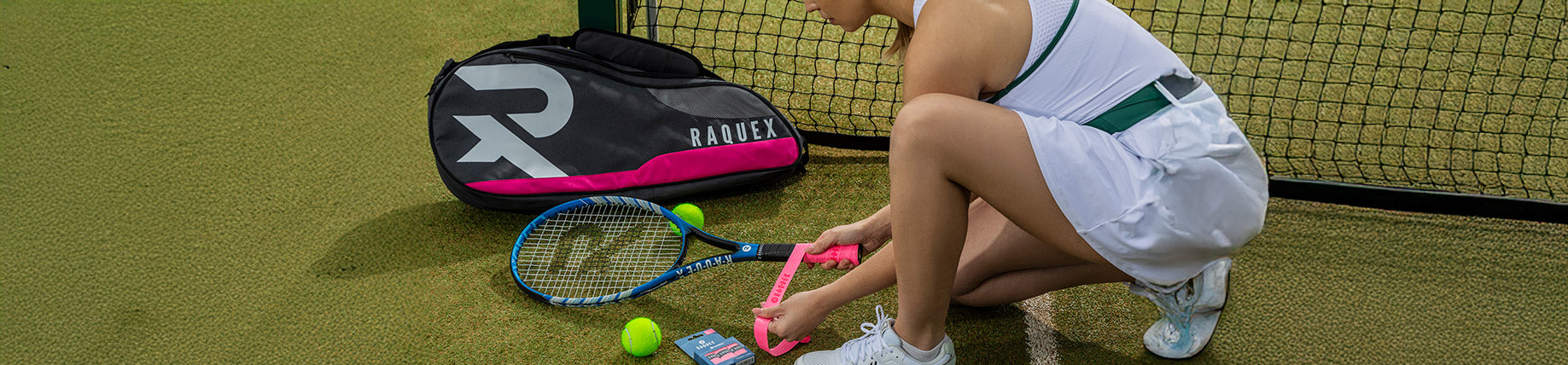 A lady on a tennis court with Raquex tennis gear, bag and racket
