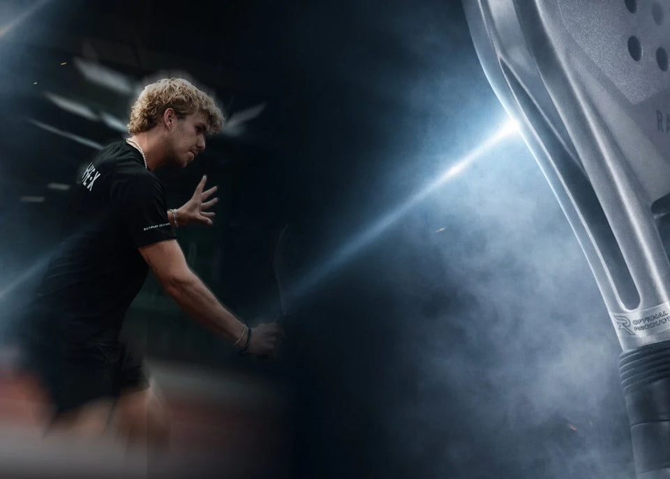 A man playing with an Evion racquet by Raquex
