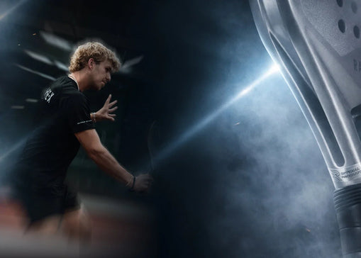 A man playing with an Evion racquet by Raquex