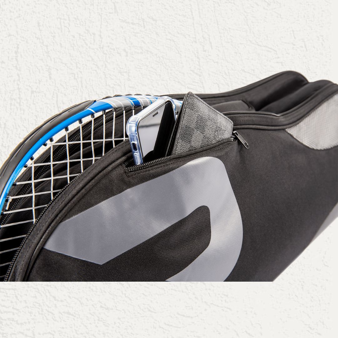 Zip compartment for phones on the raquet bag