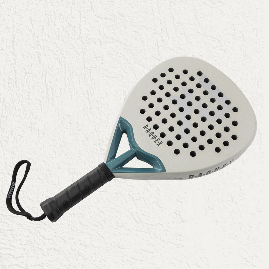 Raquex padel racquet in white with black grip and wrist strap