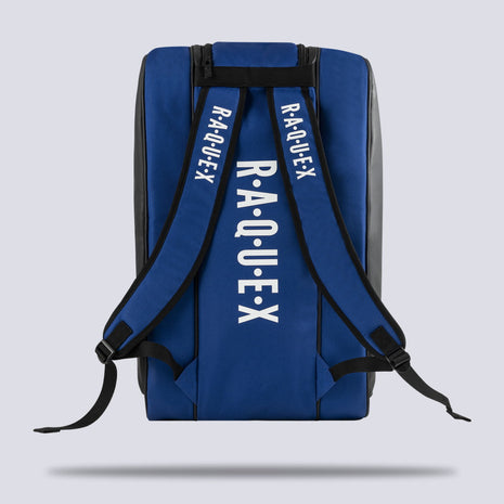 Rear of the blue Raquex Execute Tour padel bag showing the twin underside shoulder straps for backpack carry