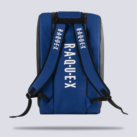 Rear of the blue Raquex Execute Tour padel bag showing the twin underside shoulder straps for backpack carry