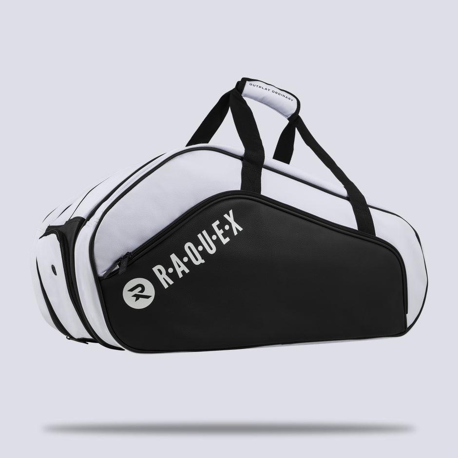 Raquex Execute Tour padel racquet bag in white and black, three-quarter front view with padded top handles