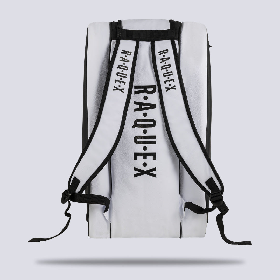 Rear of the white Raquex Execute Tour padel bag showing the twin underside shoulder straps for backpack carry