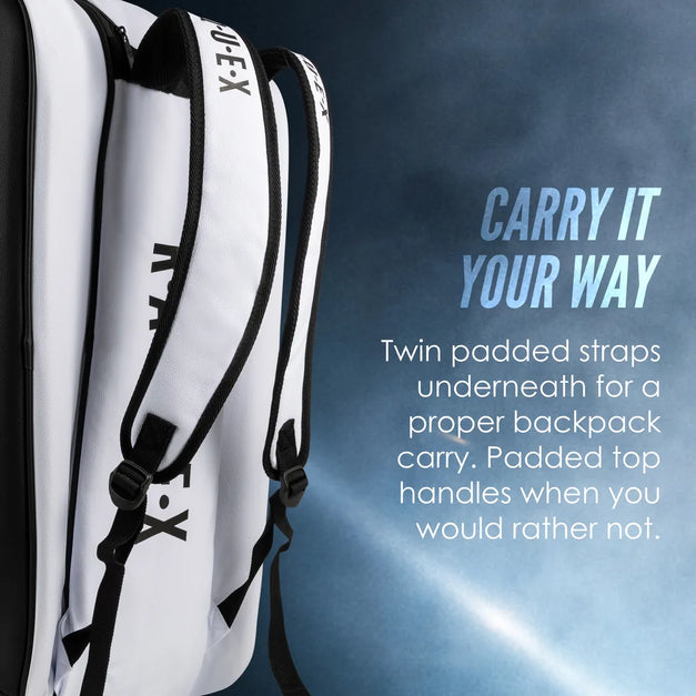 Twin padded straps underneath the white Raquex Execute Tour padel bag for backpack carry, with padded top handles as the alternative