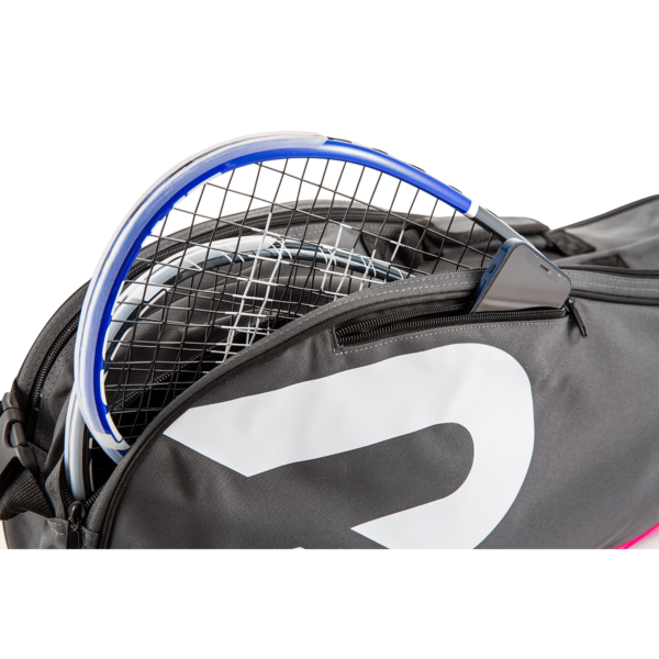 a block and pink Raquex racquet bag visibly open with multiple racquets inside, with pocket for phone