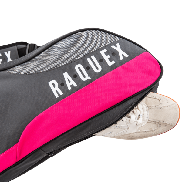 a black and pink Raquex racquet bag showing the shoe compartment