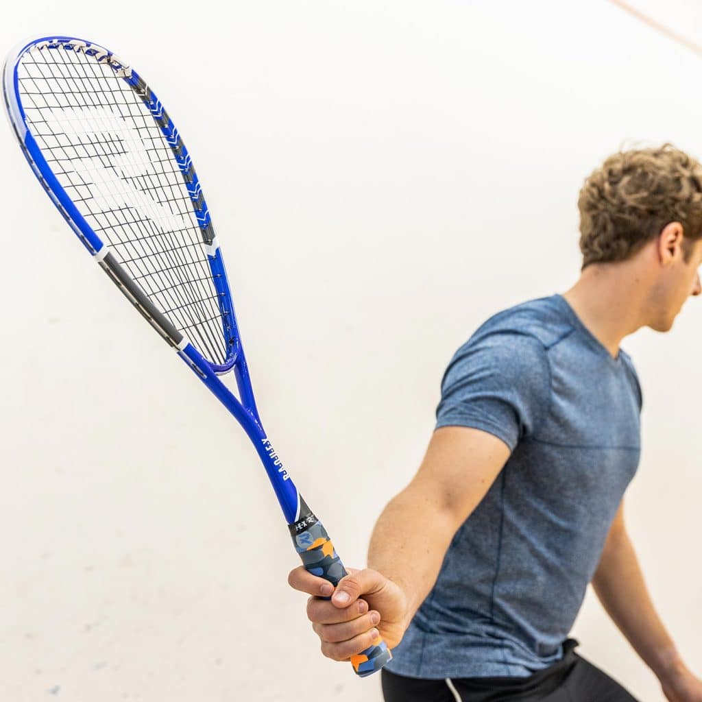 Man with a blue squash racquet